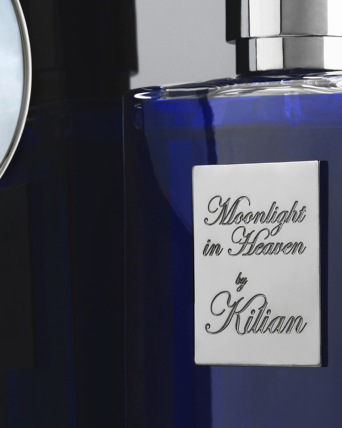 Kilian Moonlight in Heaven 50 mL Refillable Spray and its Clutch
