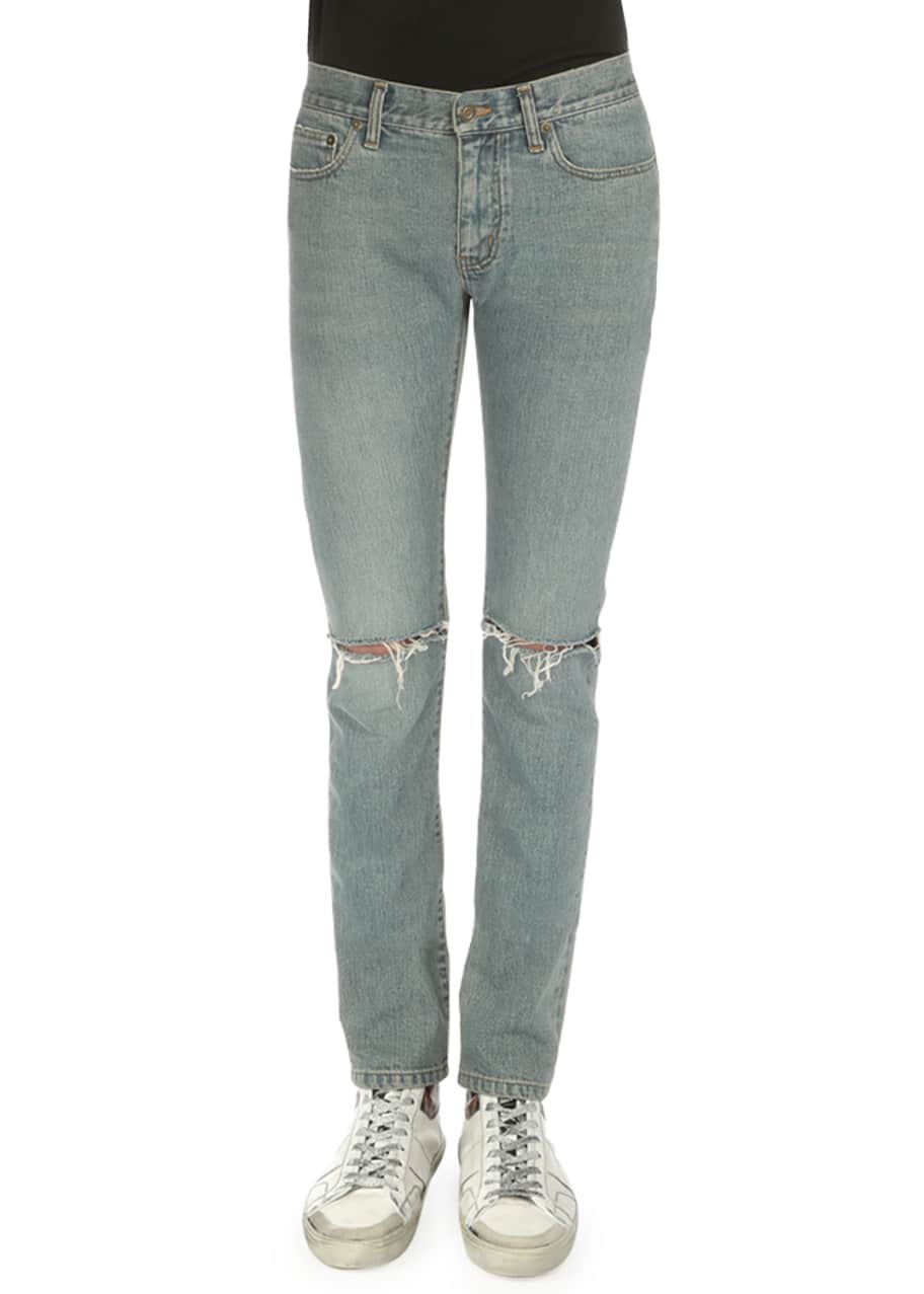 Destroyed knee jeans top