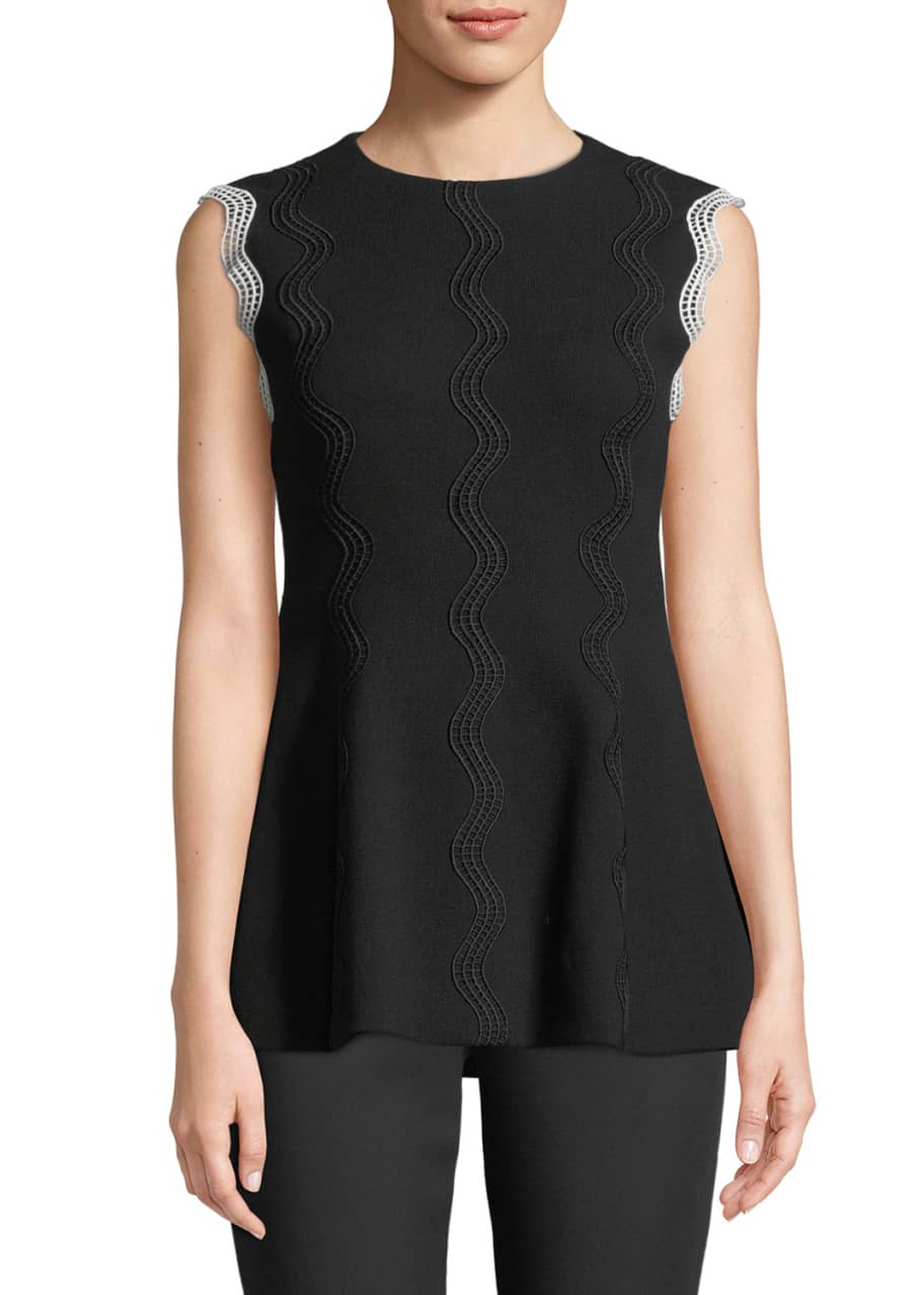 Image 1 of 1: Wave-Embroidered Peplum Top