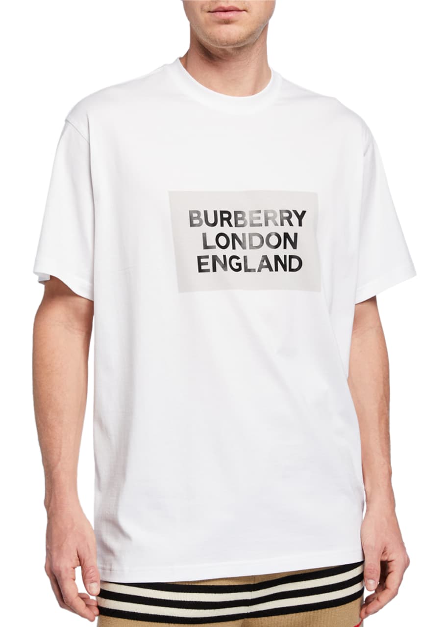 MILAN - JUNE 16: Men with Burberry shirt and Valentino white shirt