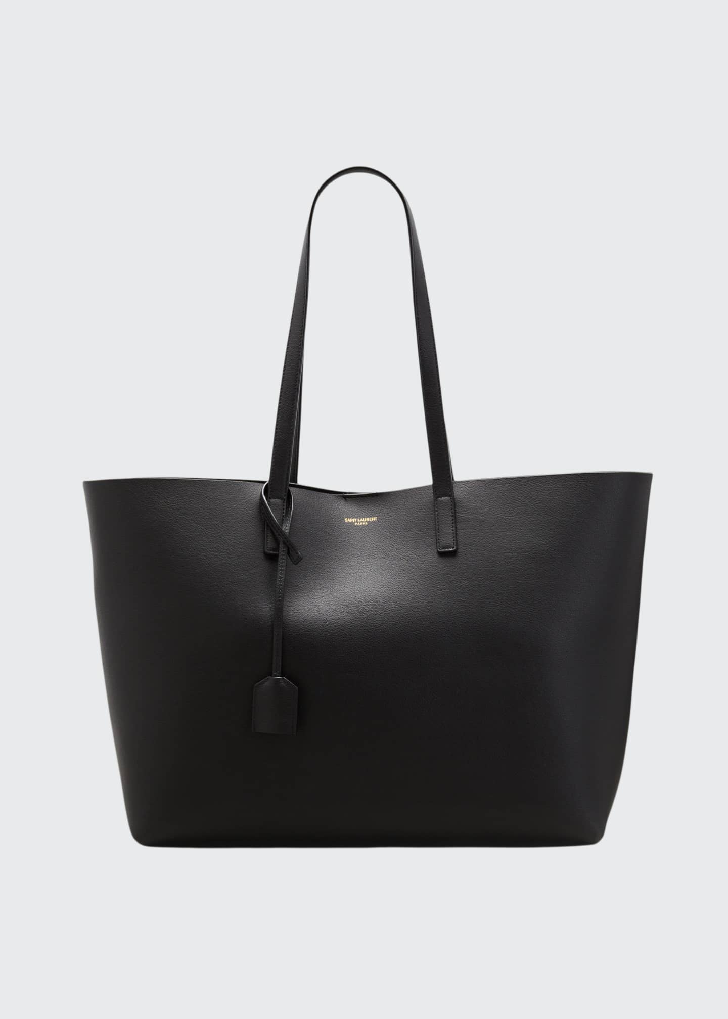 Saint Laurent East West Calfskin Shopping Tote Bag In 6008 Opyum Red