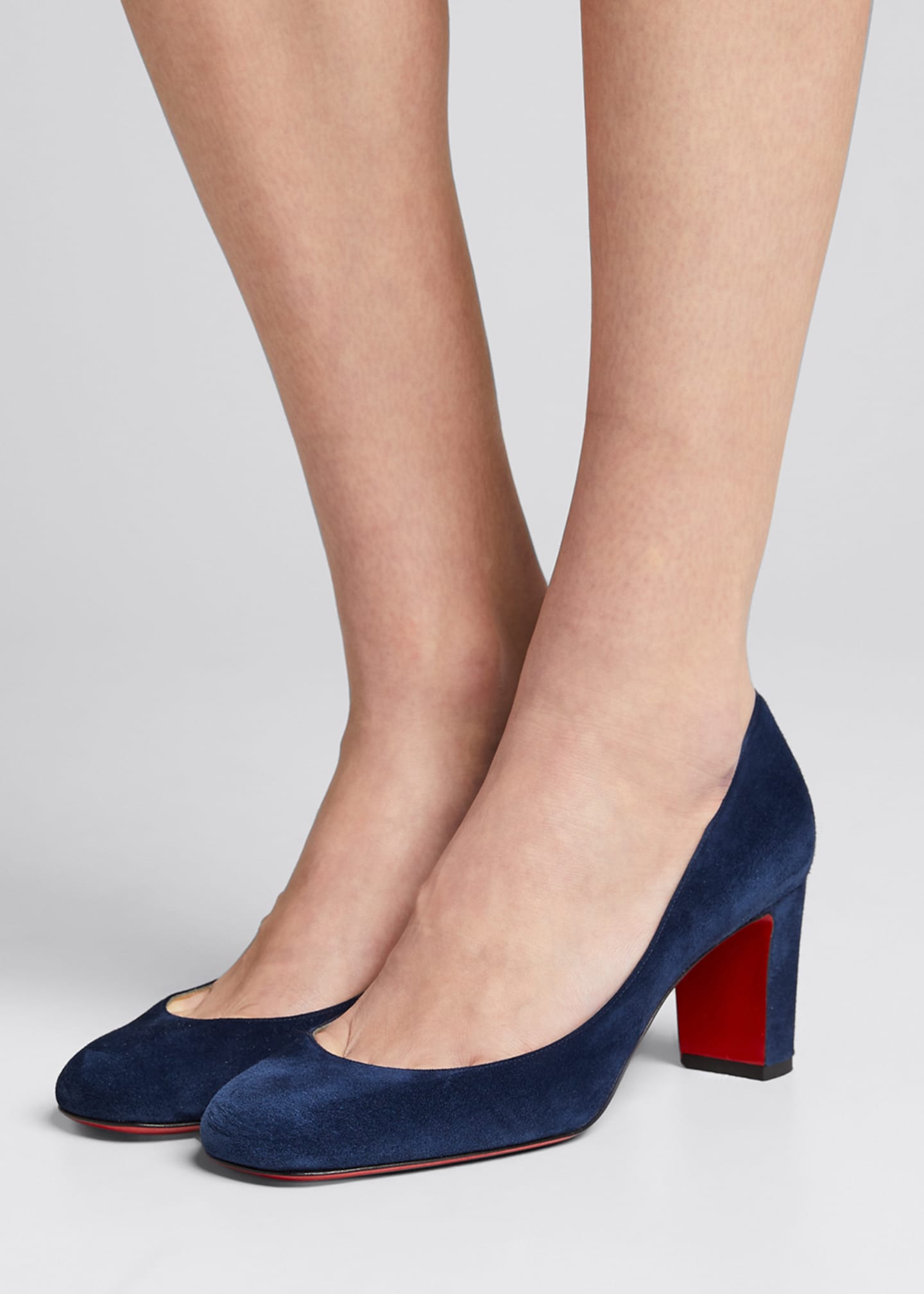 designer pumps with red soles