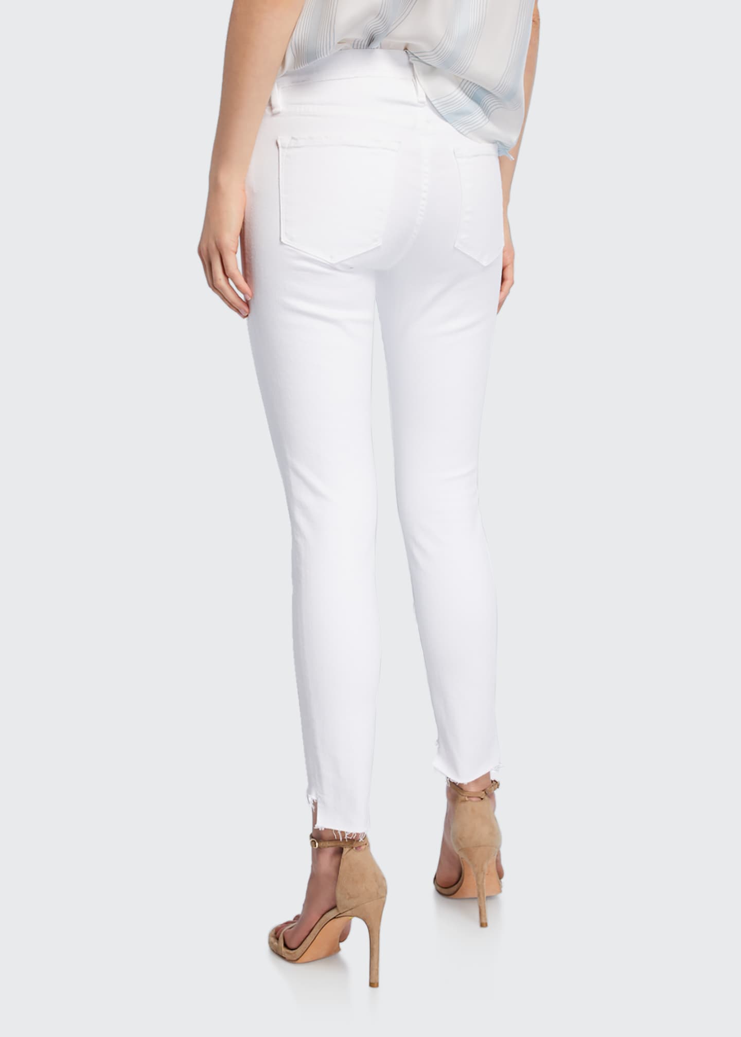frame le skinny de jeanne raw stagger hem jeans